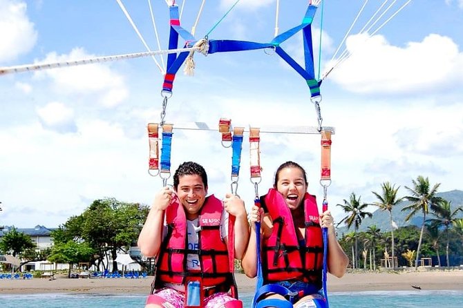 Adventure Combo: Party Boat Cruise & Parasailing - Taking to the air above Punta Cana