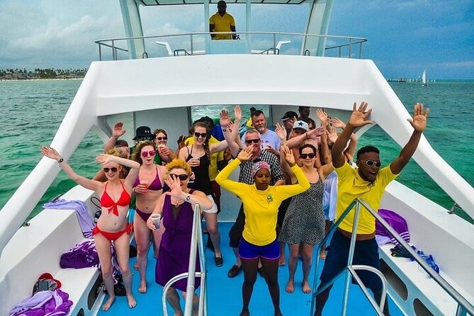 Boat Party with Drinks and Snacks with Transportation Included - Snorkeling, tropical fish, and the onboard slide