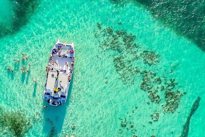 Catamaran Cruise with Snorkeling & Parasailing - The Natural Pool near Saona Island