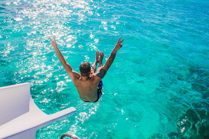Float & Feast Private Party Cruise with Premium Buffet & Open Bar - The slide, music, and Dominican dancing