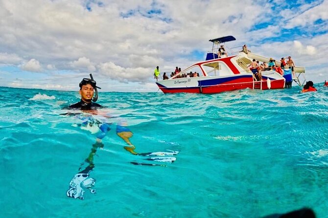 Full Day ATV, Coffee, Chocolate Tasting & Party Boat - Boarding the catamaran at Bavaro Beach