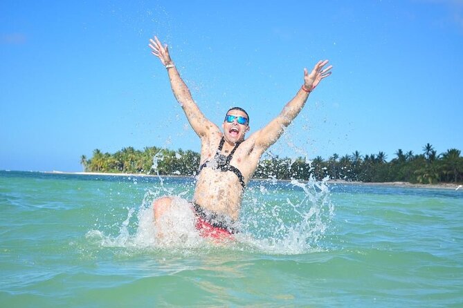 Full Day ATV Experience and Booze Cruise with Open Bar - Boarding the snorkeling catamaran