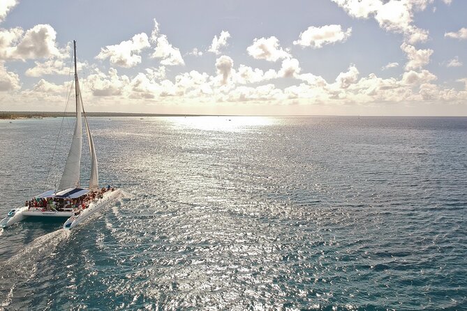 Full-Day Tour to Saona Island Sailing with Lunch and Beverages - The catamaran return and onboard atmosphere