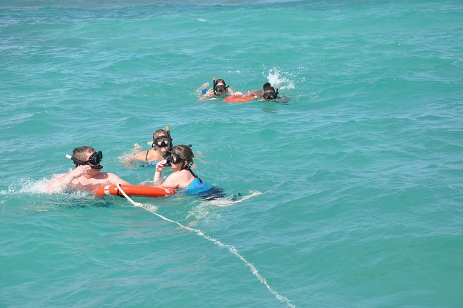 Great Snorkeling Cruise with Sharks & Stingray Encounter and Natural Pool - Meeting at Bavaro Beach and getting aboard