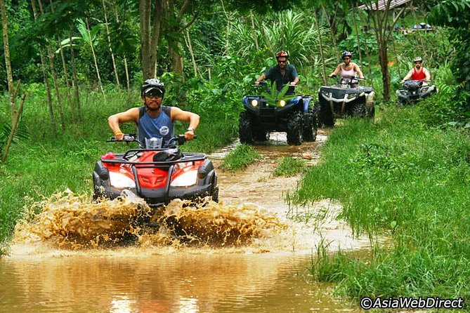 Half-Day Adventure 4x4 ATV, Water Cave and Dominican Culture - Riding through Dominican countryside and mud