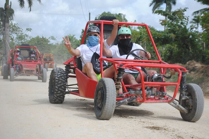 Macao Beach Buggy Tour - Entering the cenote for a cool swim