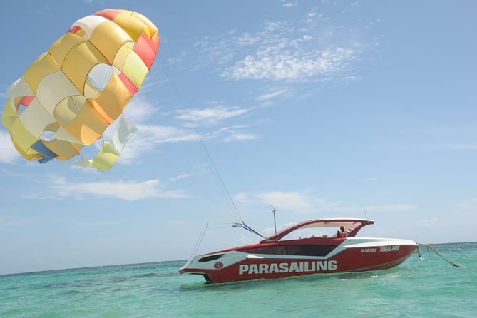 Parasailing Adventure from Punta Cana - Getting ready with the included equipment