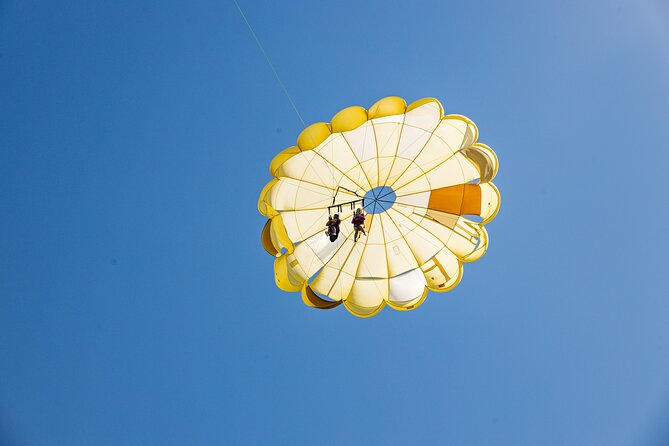 Parasailing Yacht Experience in Punta Cana - Drinks, music, and photos