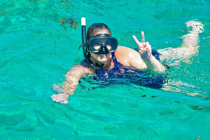 Private Catamaran wonderful Snorqueling slide & entartaiment team - Sandbar swimming and unlimited drinks
