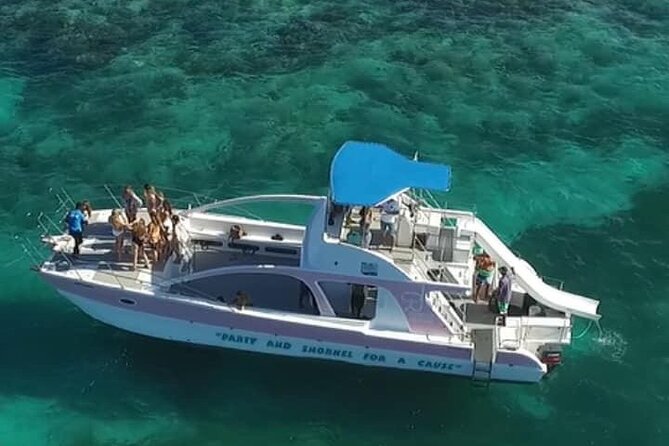 Private Party Boat with Slide and chicken skewers at Punta Cana - What this private Punta Cana boat day is really like
