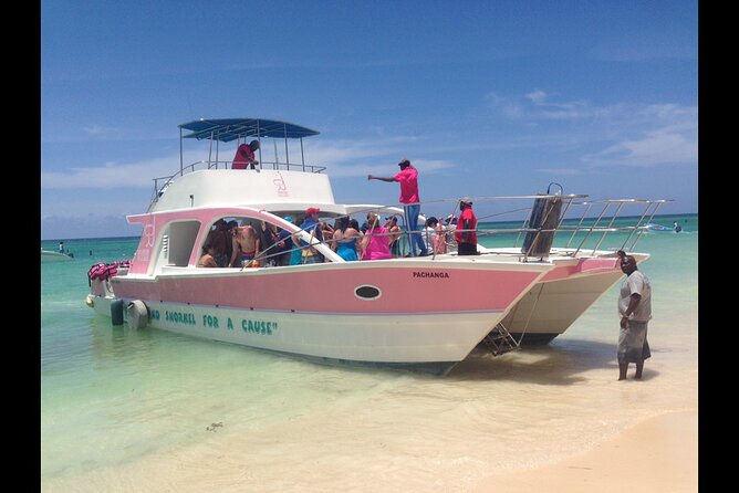 Private Party Boat with Slide and chicken skewers at Punta Cana - The natural pool stop includes lunch and a floating bar