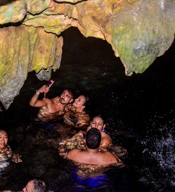 Punta Cana Buggy Tour with Cave, Macao Beach, and Mamajuana - Swimming in the clear Taino cave