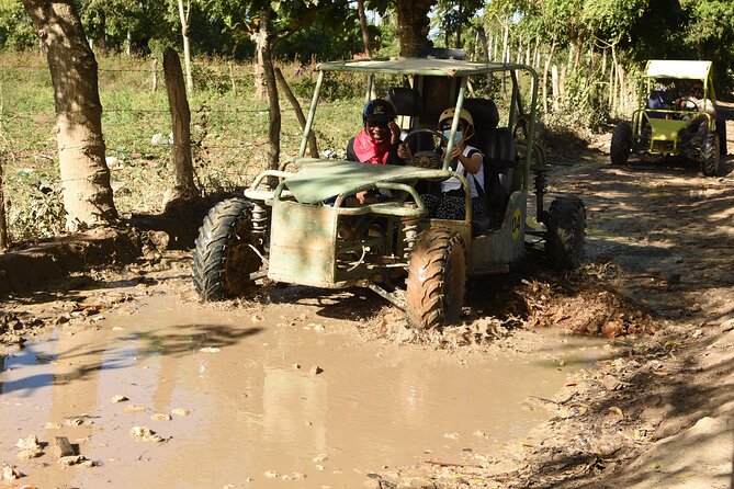 Punta Cana Buggy with Cave Dip, Mamajuana Tasting & Macao Beach - A muddy route beyond Punta Cana’s resorts
