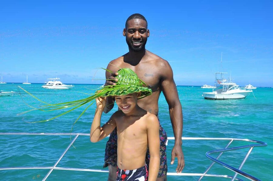 Punta Cana: Catamaran Tour with Reef Snorkeling and Open Bar - Snorkeling with fish in clear, shallow water