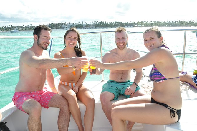 Punta Cana Combo Tour: Snorkeling, Catamaran Cruise & Parasailing - Snorkeling in shallow water near tropical fish