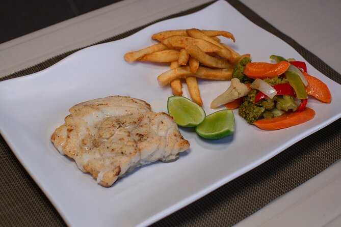 Punta Cana Exclusive Adults-Only Snorkel with Food and Drinks - Floating lunch with grilled chicken, fish, and seafood choices