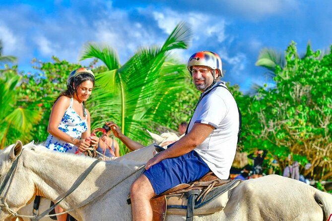 Punta Cana Horseback Ride: Jungle, Macao Beach & Free Pick Up - A beach ride with a rural stop