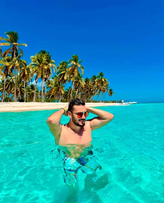 Punta Cana: Saona Island VIP | Private Beach, Open Bar & Lunch - The catamaran crossing: music, drinks, and Caribbean air