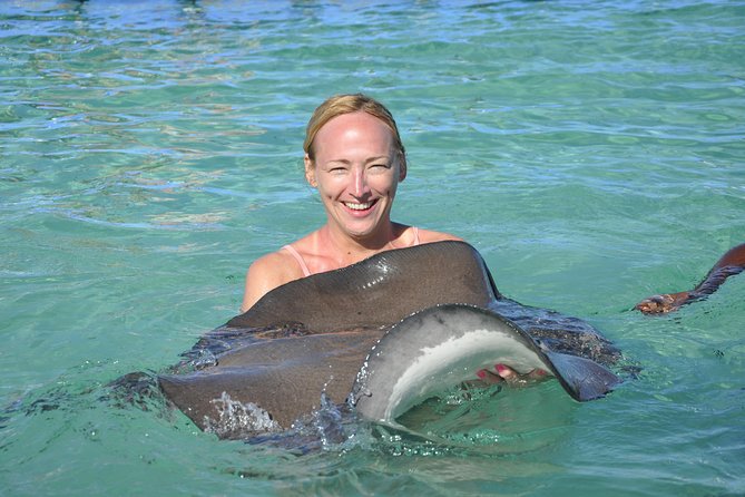 Sharks & Stingrays Encounter and Small Boat Ride from Punta Cana - Snorkeling over fish and coral