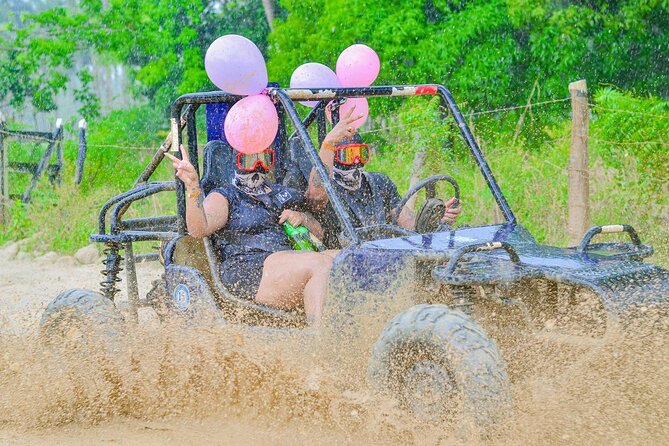 Tour Moto ATV en Punta Cana, Playa, Cueva Taína y Casa Dominicana - Macao Beach gives the mud a clean break