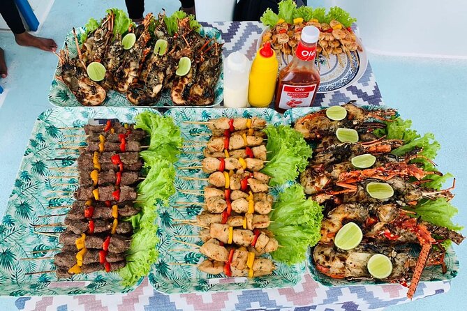 VIP Private Booze Cruise with Live Dj and BBQ in Punta Cana - BBQ lunch with seafood, skewers, and snacks